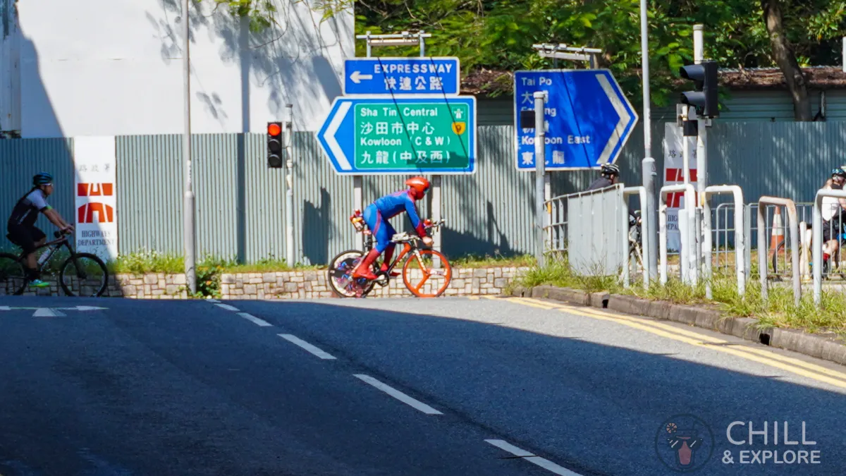 Spiderman cycling past Kiu Ha Road