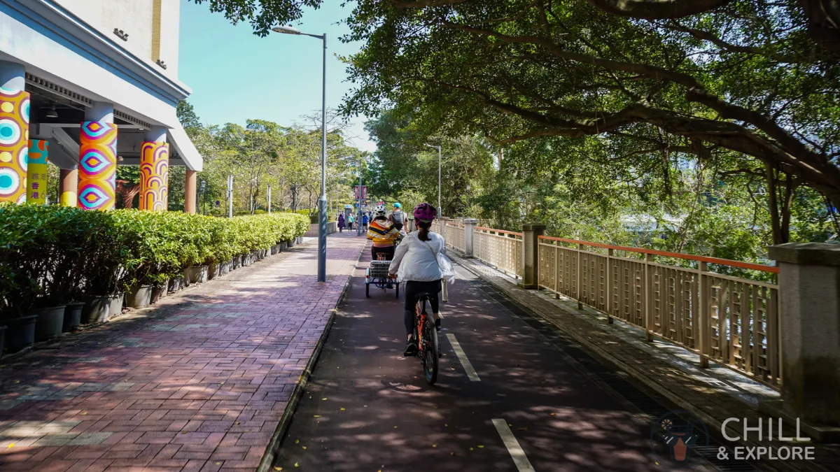 Cycling past Hong Kong Heritage Museum